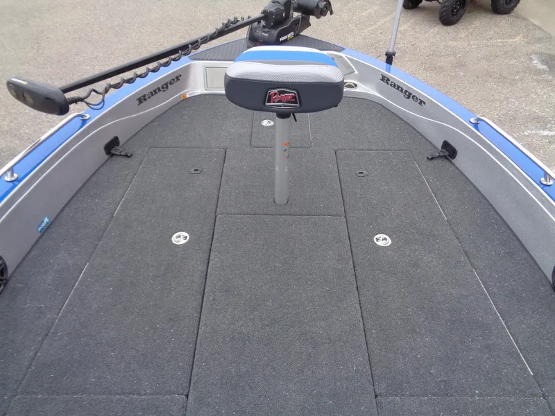 Slide: The Image of 2024 Ranger 622FS Pro boat deck with seating and storage compartments. - 14