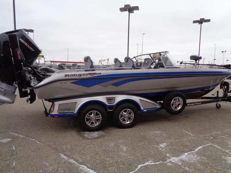 Slide: The Image of 2024 Ranger 622FS Pro boat on trailer, side view, outdoors. - 5