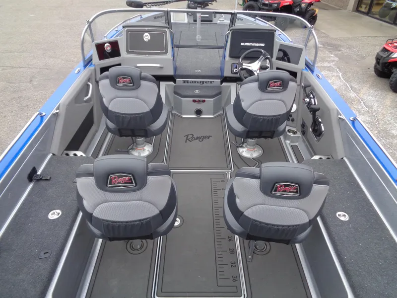 Slide: The Image of 2024 Ranger 622FS Pro boat interior with four seats and steering console. - 6