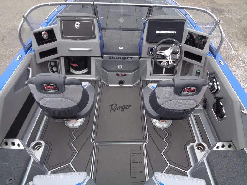 Slide: The Image of 2024 Ranger 622FS Pro boat interior with dual seats and advanced navigation systems. - 7