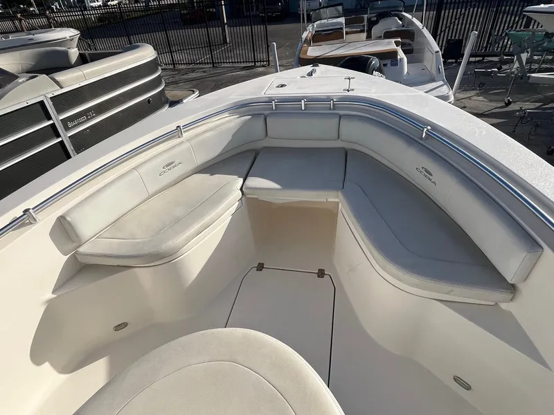 Slide: The Image of 2022 Cobia 237 Center Console boat with spacious seating and sleek design. - 3
