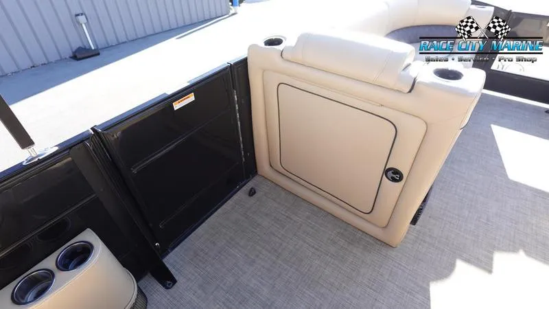 Slide: The Image of 2020 Barletta L23UC boat interior with seating and cup holders. - 21