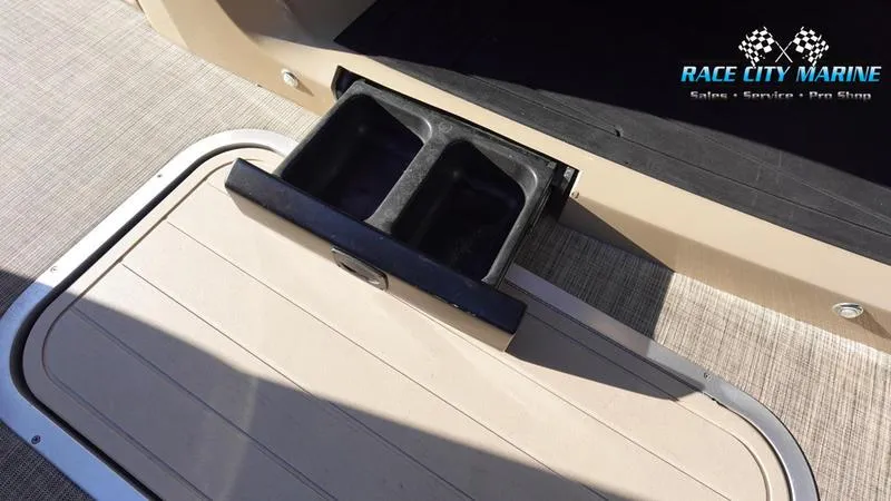 Slide: The Image of 2020 Barletta L23UC boat with built-in cup holders on deck. - 24
