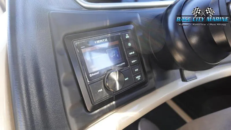 Slide: The Image of 2020 Barletta L23UC boat dashboard with Hertz audio system. - 33