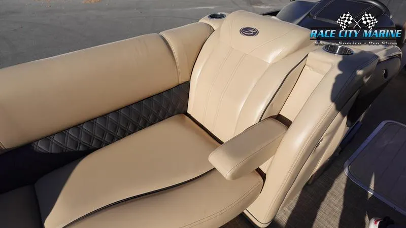 Slide: The Image of 2020 Barletta L23UC boat with beige leather seating, Race City Marine logo visible. - 39