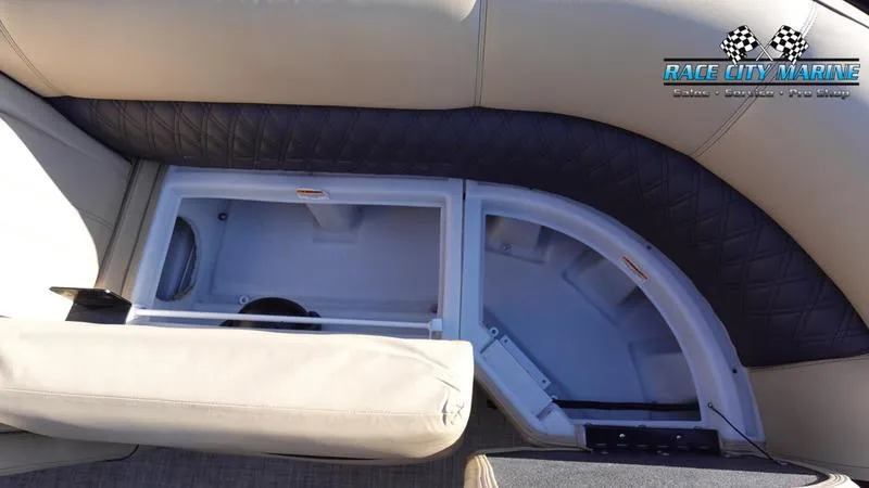 Slide: The Image of Barletta L23UC 2020 boat interior storage compartment with cushioned seating. - 40