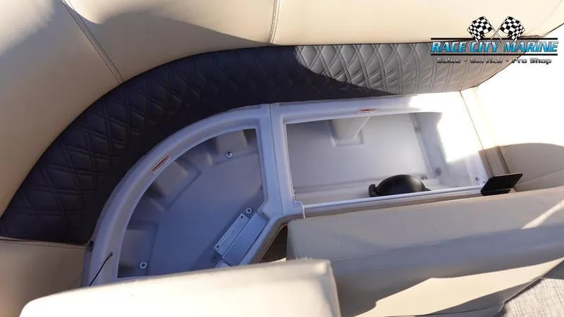 Slide: The Image of 2020 Barletta L23UC boat interior storage compartment with quilted upholstery. - 41
