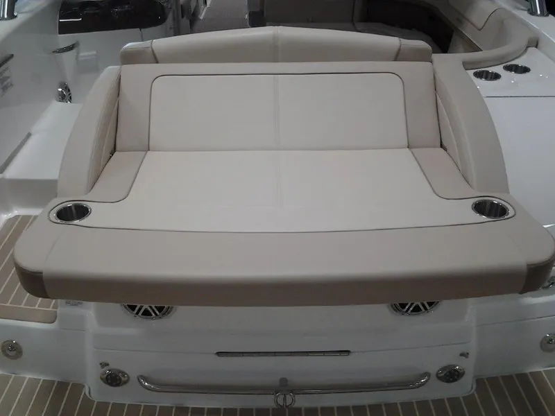 Slide: The Image of 2016 Formula 350 Crossover Bowrider, beige seating area with cup holders. - 16