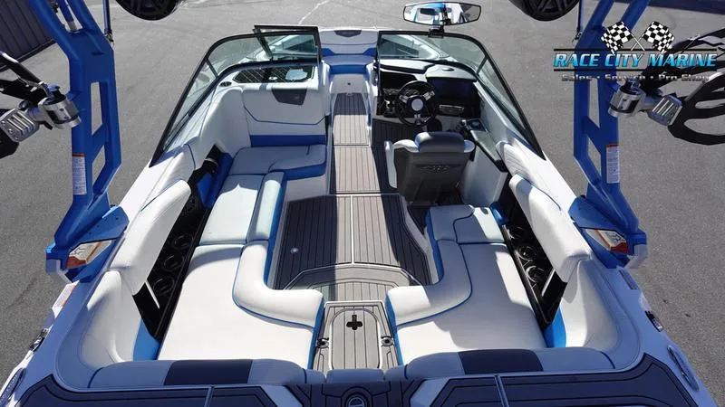 Slide: The Image of 2019 Nautique Super Air Nautique GS20 interior with sleek seating and modern dashboard. - 14
