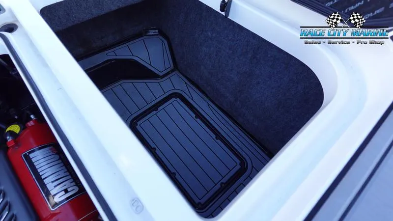 Slide: The Image of 2019 Nautique Super Air Nautique GS20 storage compartment with Race City Marine branding. - 19