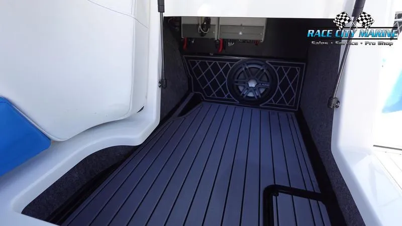 Slide: The Image of 2019 Nautique Super Air Nautique GS20 interior with sleek flooring and sound system. - 27