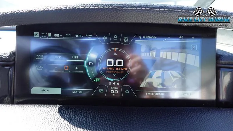 Slide: The Image of 2019 Nautique Super Air Nautique GS20 dashboard display with digital controls and navigation. - 34