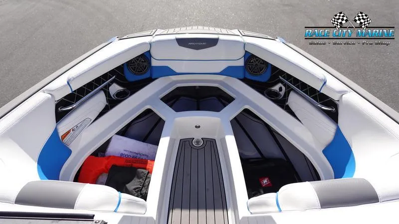 Slide: The Image of 2019 Nautique Super Air Nautique GS20 boat interior with seating and storage. - 39