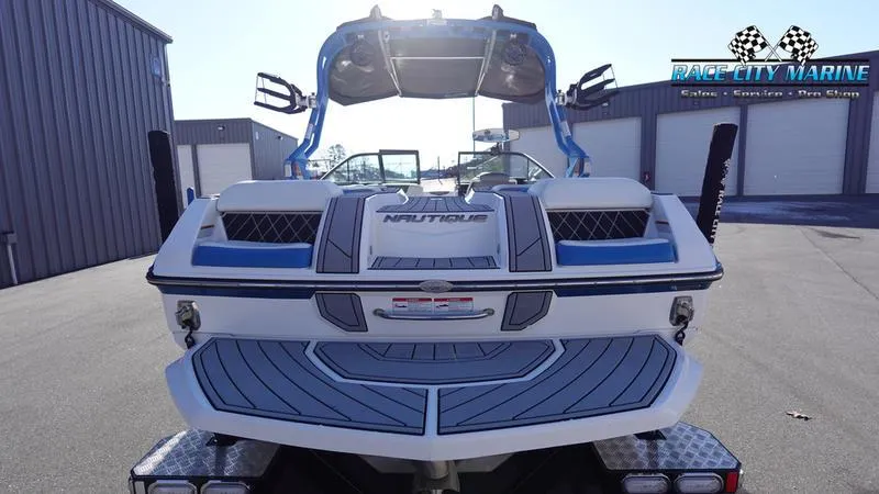 Slide: The Image of 2019 Nautique Super Air Nautique GS20 boat rear view at Race City Marine. - 4