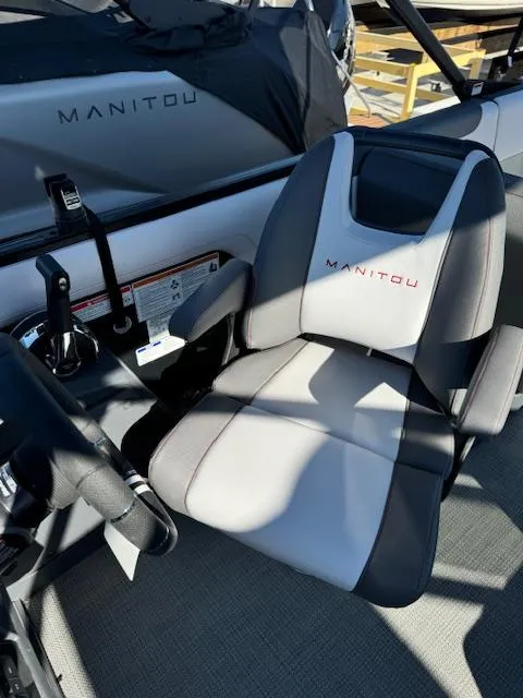 Slide: The Image of 2025 Manitou 22' Cruise Bench Twin Tube boat seat, gray and black design. - 5