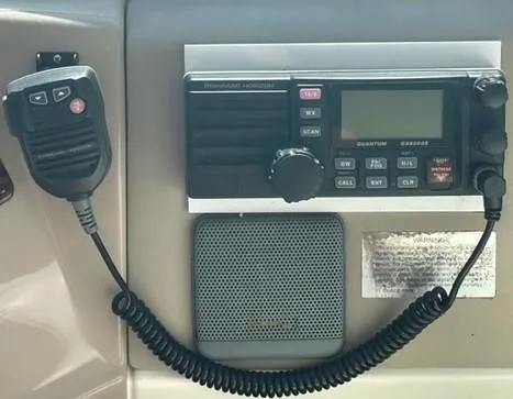 Slide: The Image of VHF radio system on a 2001 Sea Ray Sundancer 540 yacht dashboard. - 43