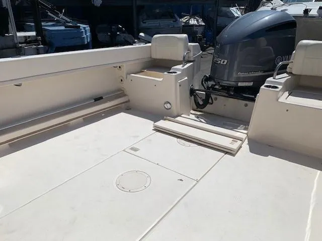 Slide: The Image of 2014 Grady-White Seafarer 226 boat interior with Yamaha outboard motor. - 3