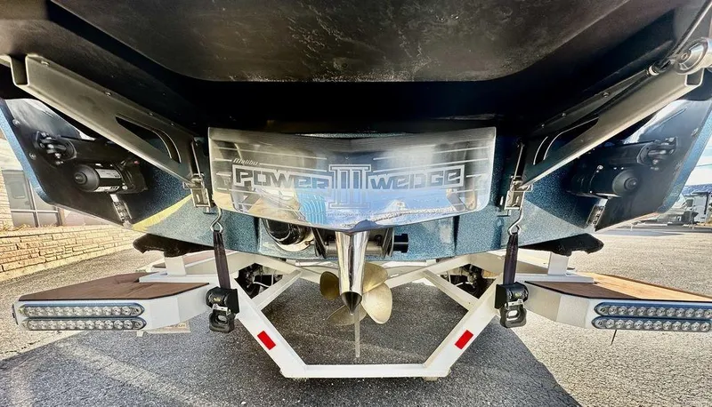Slide: The Image of 2023 Malibu M220 boat with Power Wedge III, rear view. - 3