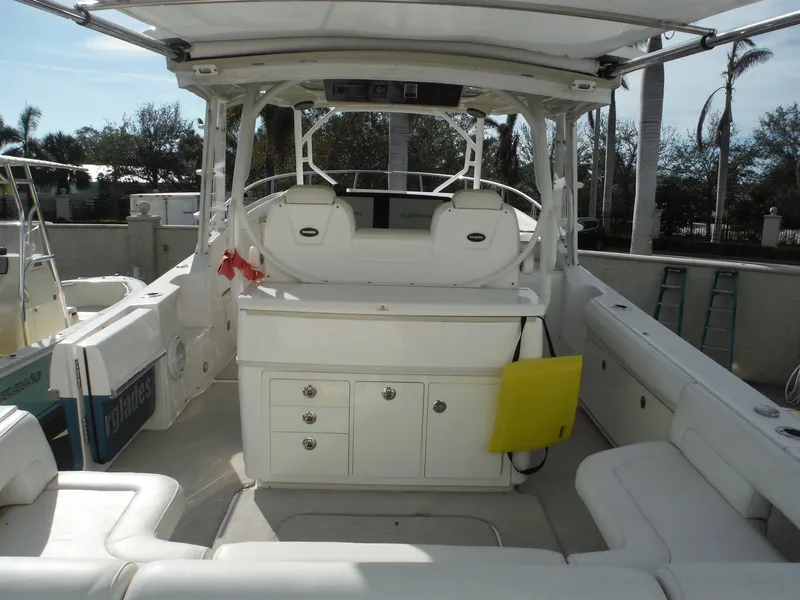 Slide: The Image of 2017 Everglades 360LXC boat interior with seating and storage compartments. - 19
