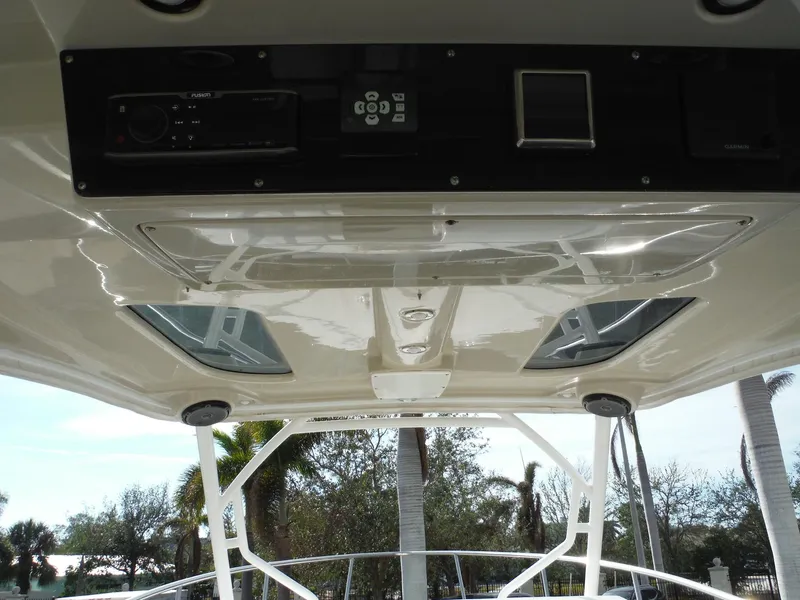 Slide: The Image of Interior view of 2017 Everglades 360LXC boat, featuring control panel and skylights. - 24