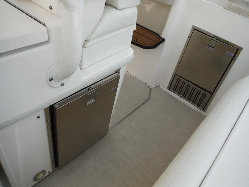 Slide: The Image of Interior of 2017 Everglades 360LXC boat with built-in stainless steel appliances. - 26