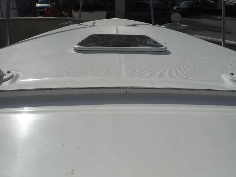 Slide: The Image of 2017 Everglades 360LXC boat deck with hatch, viewed from bow. - 29
