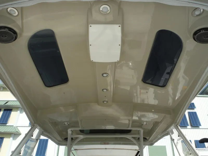 Slide: The Image of 2017 Everglades 360LXC boat ceiling with built-in speakers and lighting. - 41