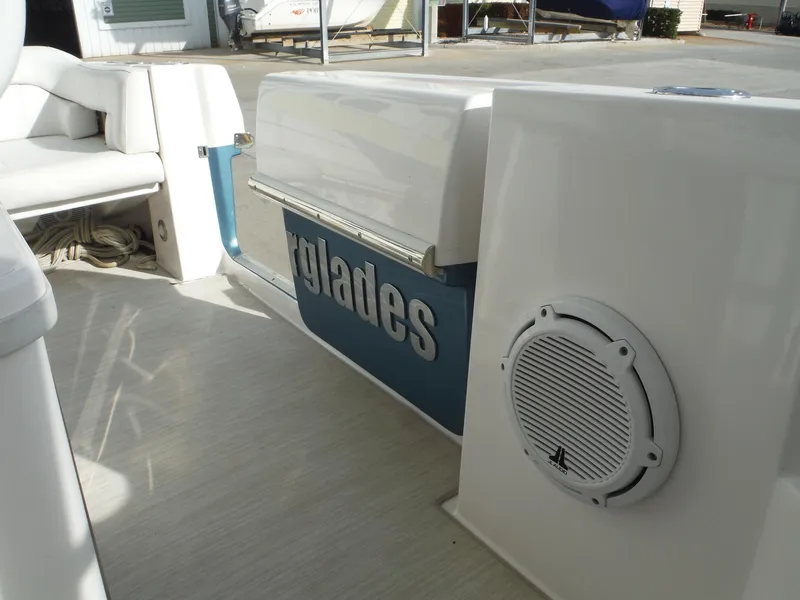 Slide: The Image of 2017 Everglades 360LXC boat interior with seating and speaker. - 43