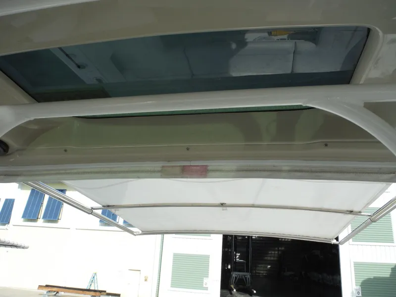 Slide: The Image of Everglades 360LXC 2017 boat canopy and roof detail in a storage facility. - 47