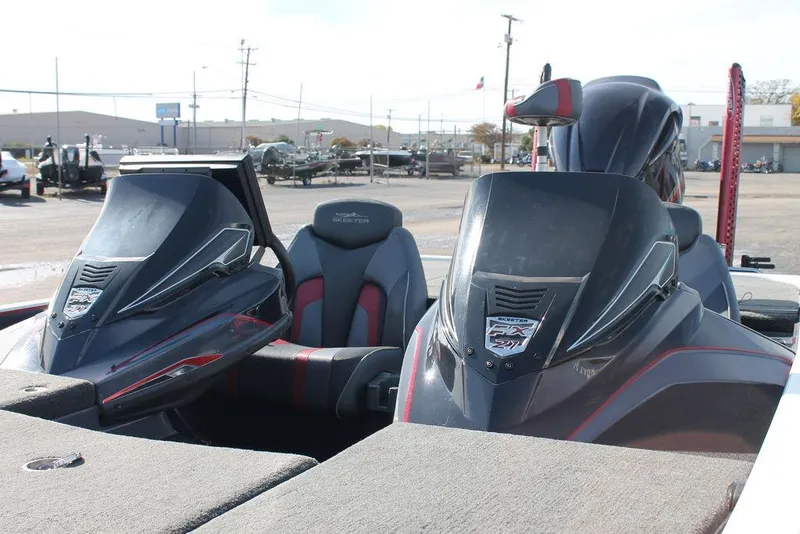 Slide: The Image of 2019 Skeeter FX21 Apex boat interior with dual consoles and seating. - 15
