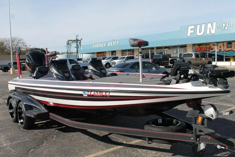 Slide: The Image of 2019 Skeeter FX21 Apex boat in parking lot, near tackle shop. - 3