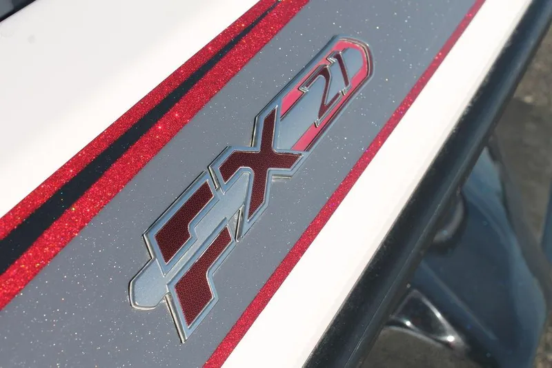Slide: The Image of Close-up of 2019 Skeeter FX21 Apex logo with red and black accents. - 7