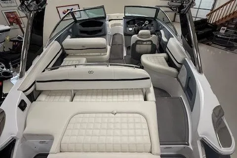 Slide: The Image of 2017 Cobalt R3 WSS Surf boat interior with luxurious white seating and modern dashboard. - 4