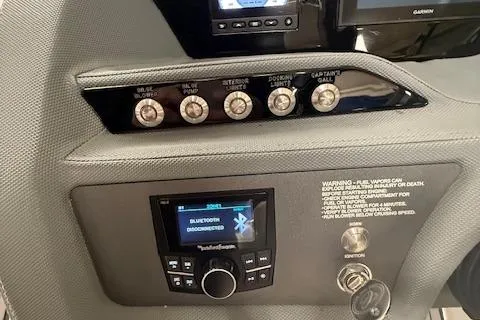 Slide: The Image of Control panel of a 2017 Cobalt R3 WSS Surf boat with Bluetooth display. - 5