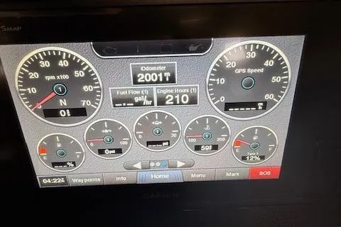 Slide: The Image of Dashboard of a 2017 Cobalt R3 WSS Surf boat showing odometer and engine metrics. - 6