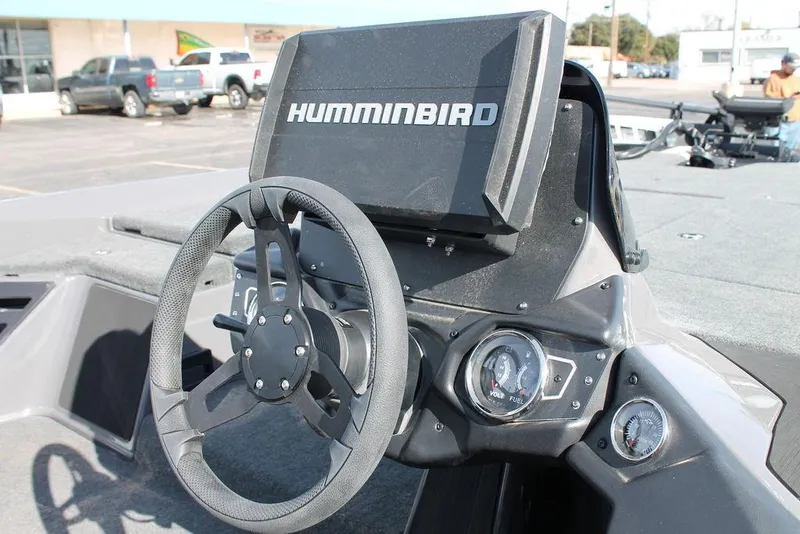 Slide: The Image of 2025 Skeeter ZXR21 boat dashboard with Humminbird navigation system. - 9