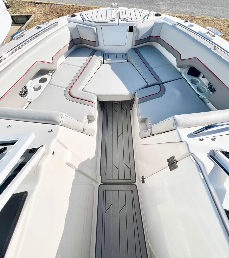Slide: The Image of 2023 Solara S-250 DC boat interior with sleek seating and modern design. - 22
