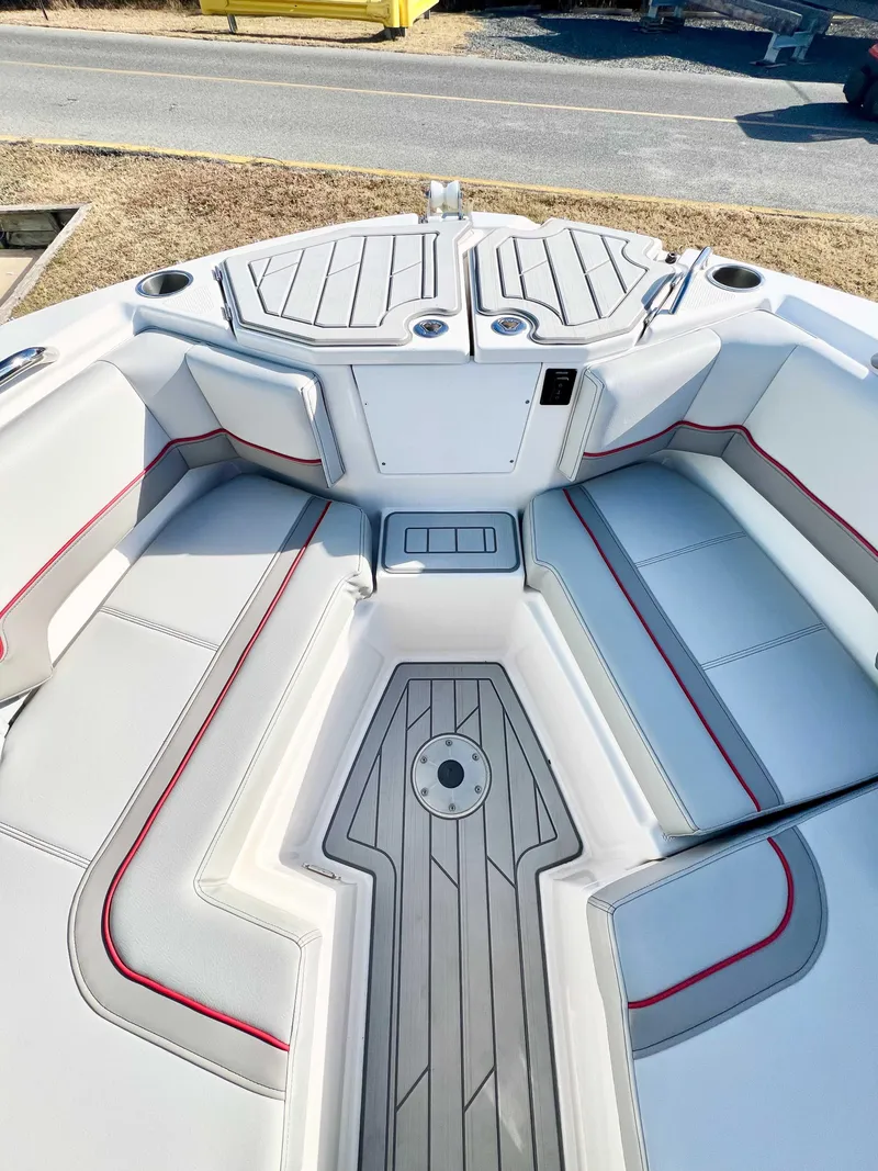 Slide: The Image of 2023 Solara S-250 DC boat interior with sleek seating and modern design. - 23