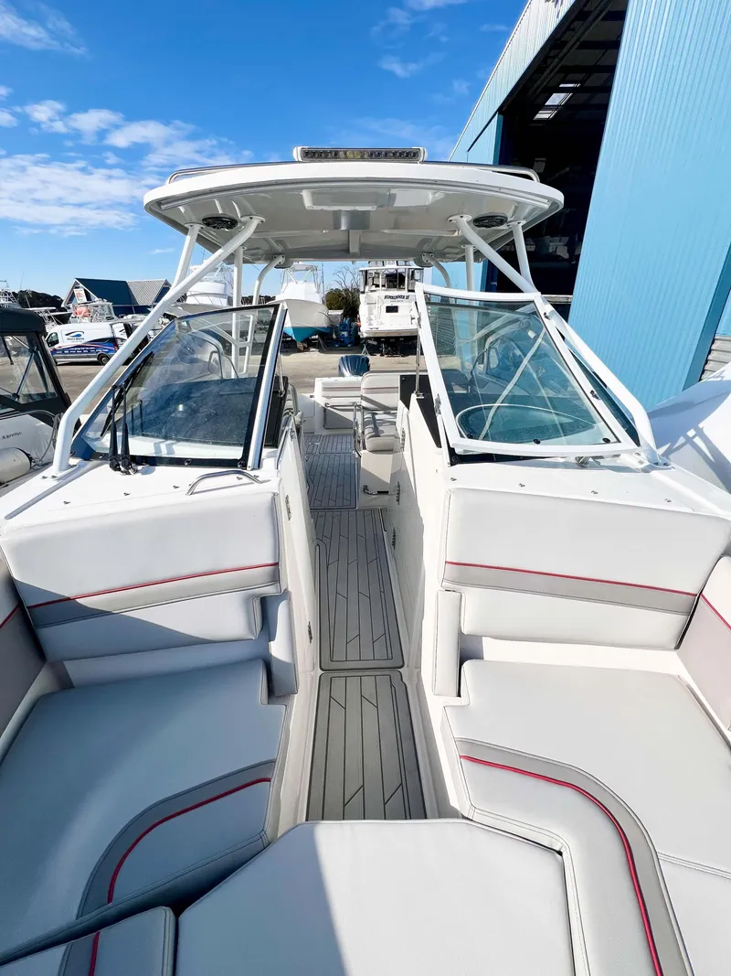 Slide: The Image of 2023 Solara S-250 DC boat with sleek design, spacious seating, and modern features. - 24