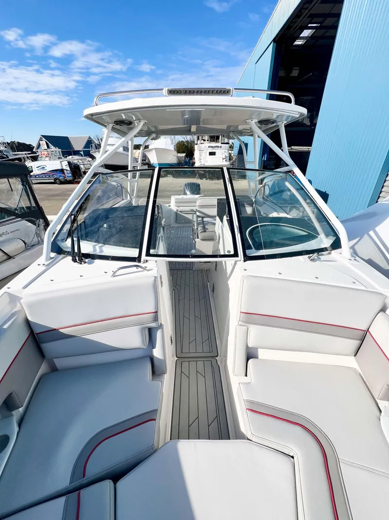 Slide: The Image of 2023 Solara S-250 DC boat with spacious seating and sleek design. - 25