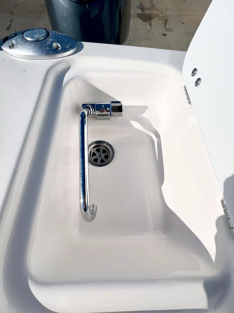 Slide: The Image of 2023 Solara S-250 DC boat sink with chrome faucet and drain. - 33