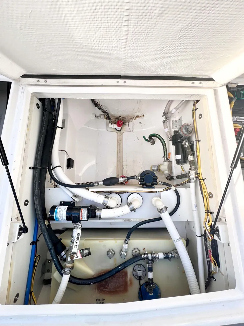 Slide: The Image of 2023 Solara S-250 DC engine compartment with visible wiring and plumbing components. - 41