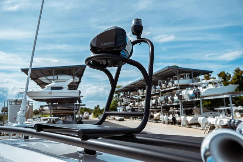 Slide: The Image of 2025 Jeanneau NC 895 Sport Series 2 radar system with boats in storage background. - 17