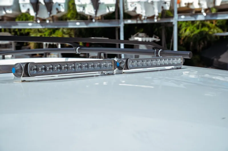 Slide: The Image of 2025 Jeanneau NC 895 Sport Series 2 boat roof with LED lights and wipers. - 18