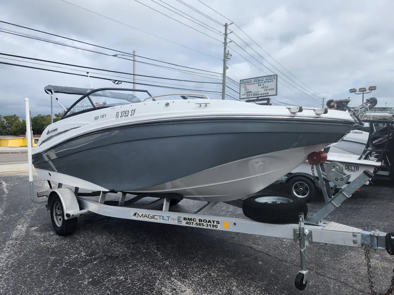Slide: The Image of 2021 Hurricane SD 191 OB boat on trailer, parked outdoors. - 4