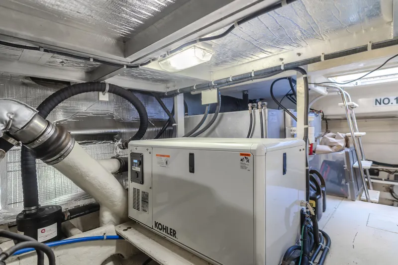 Slide: The Image of Engine room of 2007 Navigator Pilothouse with Kohler generator and ventilation system. - 33