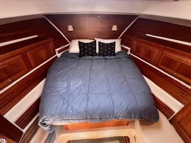 Slide: The Image of Luxurious cabin interior of 2020 Back Cove 37 yacht with cozy bedding. - 16