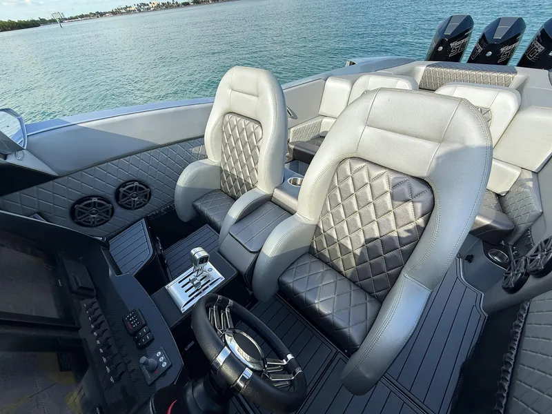 Slide: The Image of 2017 Nor-Tech 3900 Super-VEE interior with luxury seating and modern controls. - 12