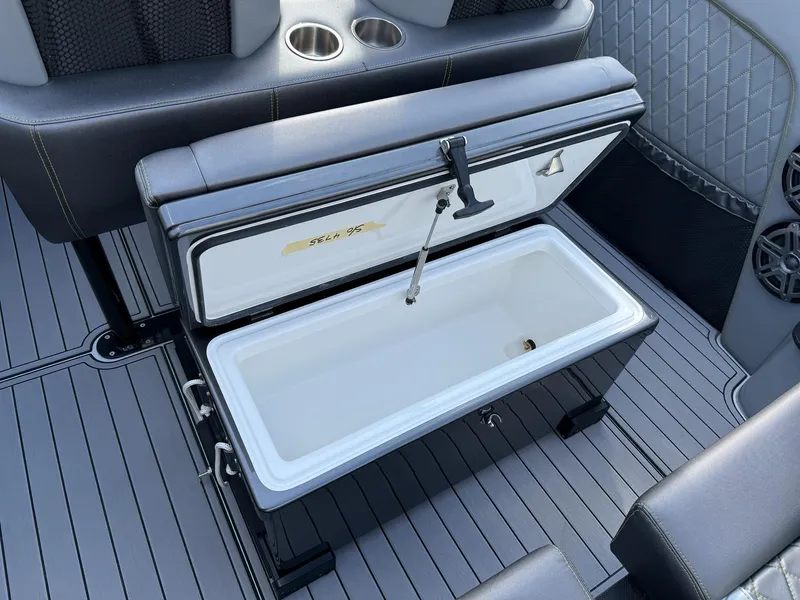 Slide: The Image of 2017 Nor-Tech 3900 Super-VEE boat interior with open storage compartment. - 16