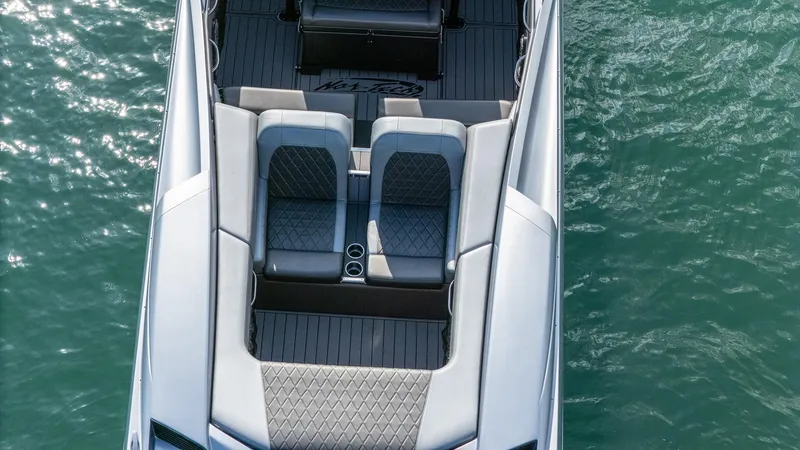 Slide: The Image of 2017 Nor-Tech 3900 Super-VEE boat on water, top view of seating area. - 39